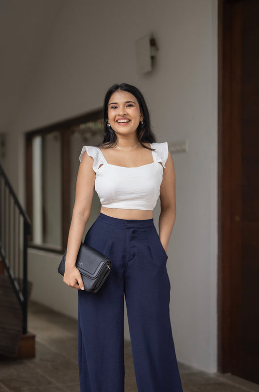 White ruffled top