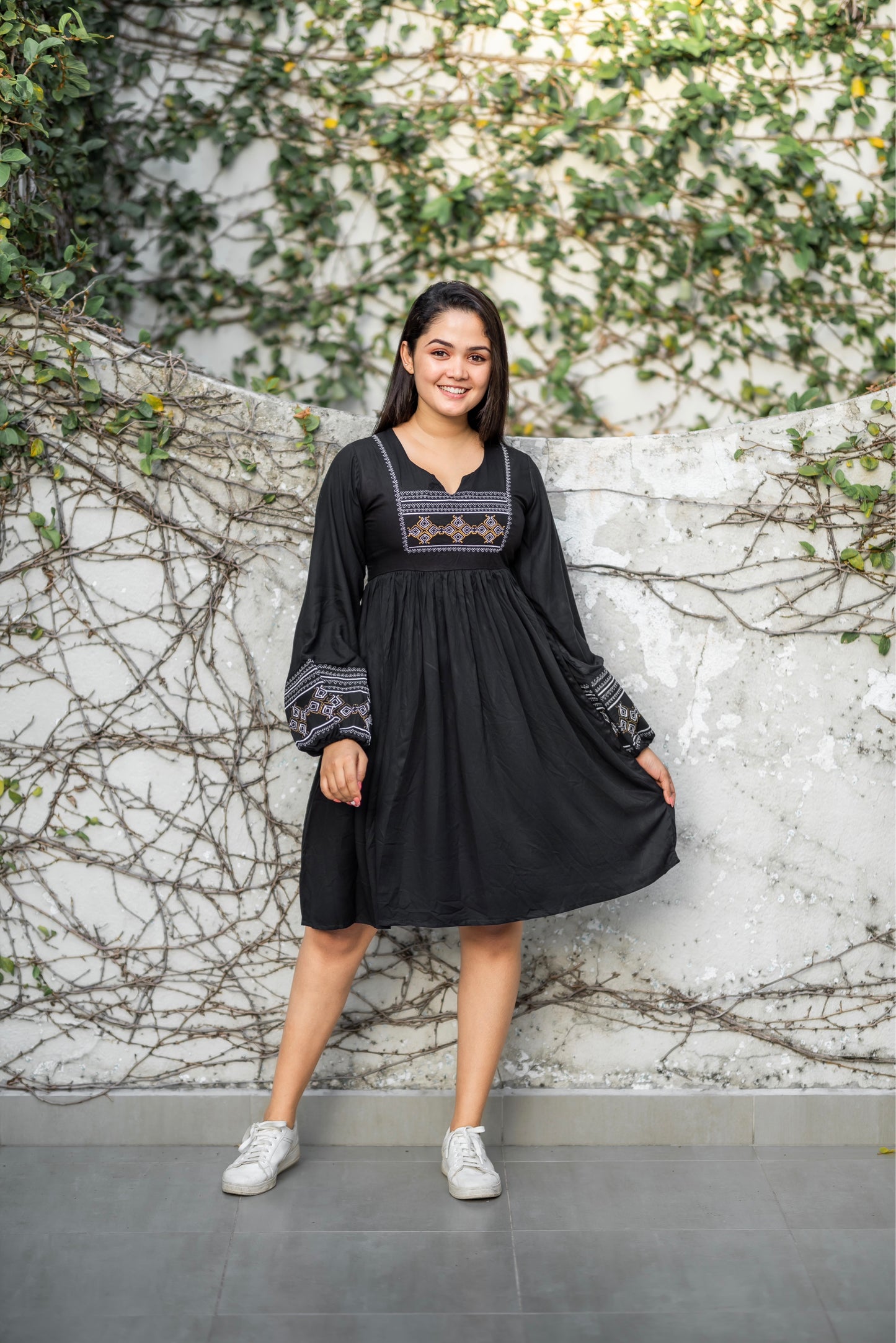 Embroidered black dress