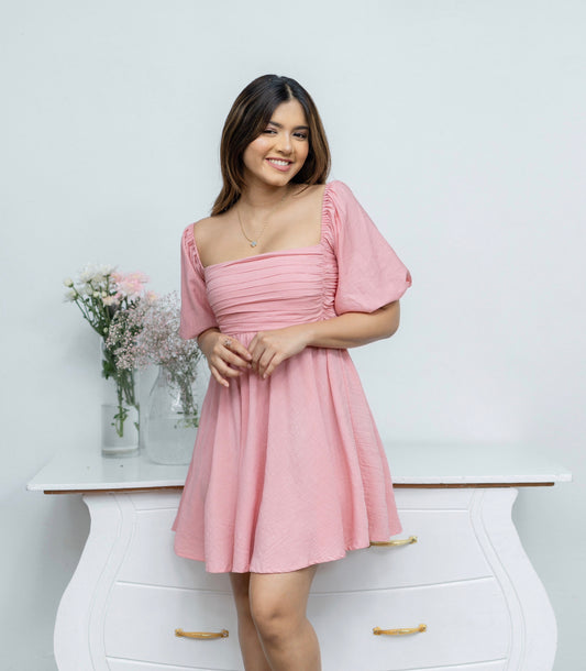 Pink ruched mini dress