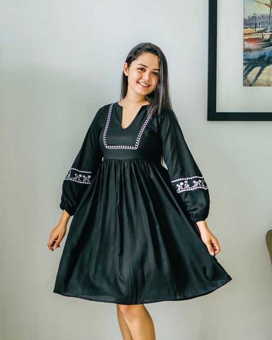 Embroidered black dress