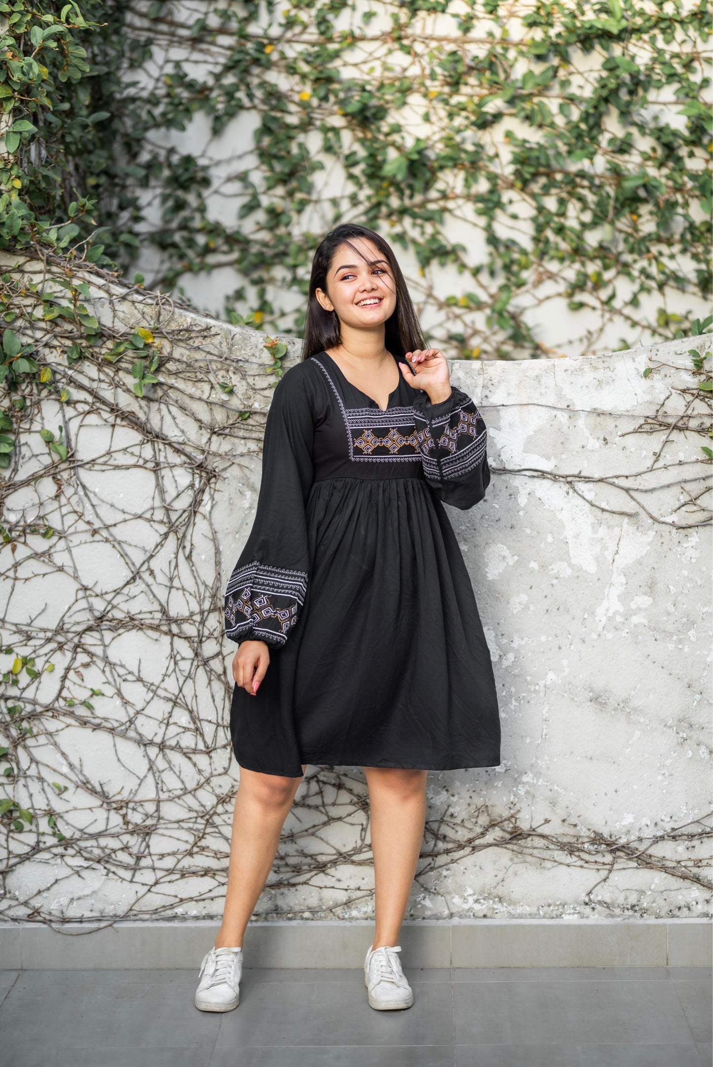 Embroidered black dress